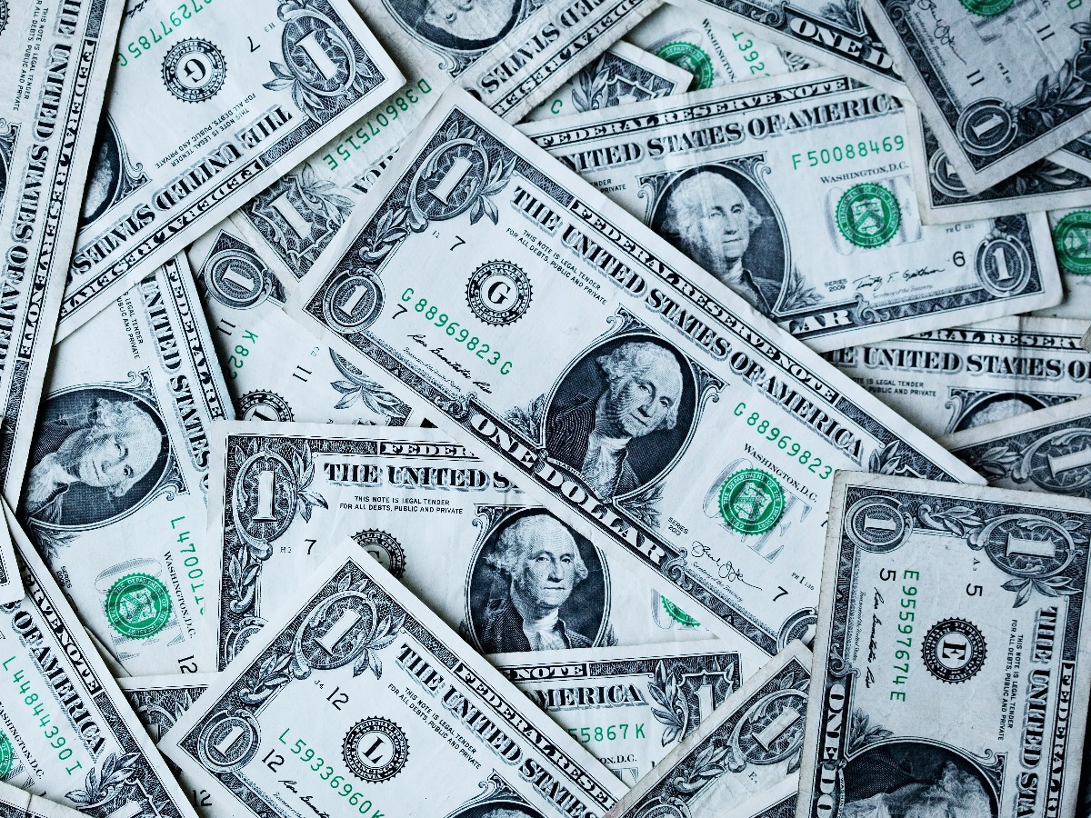 Image of dollar bill pile 
